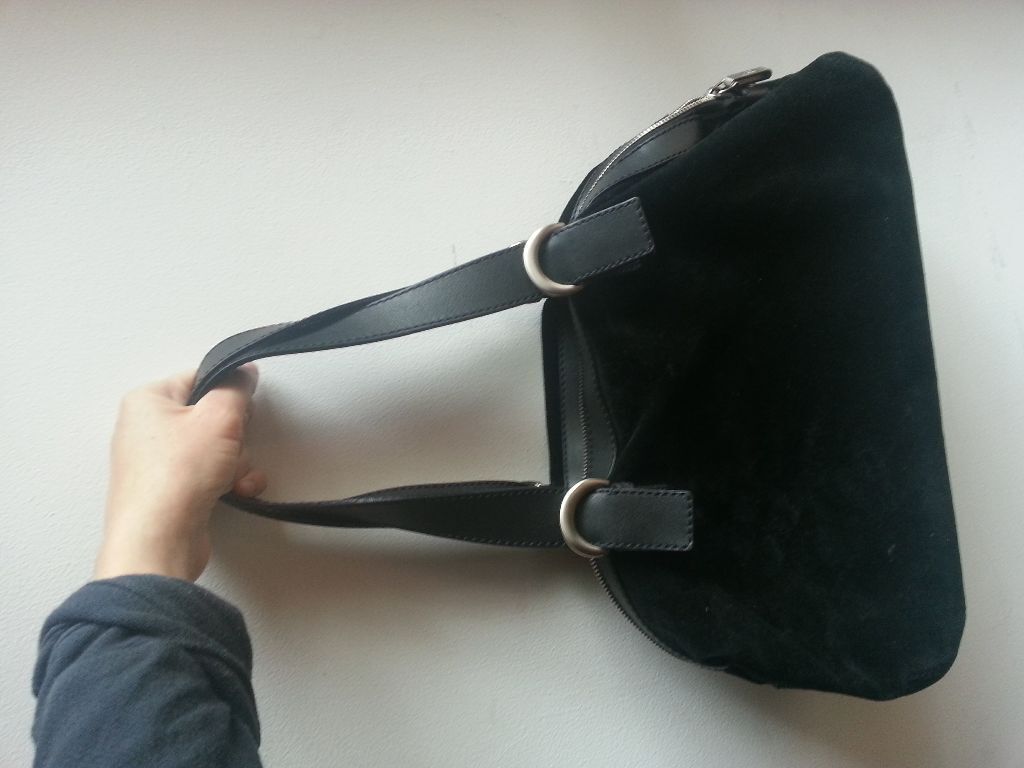 Black suede designer handbag