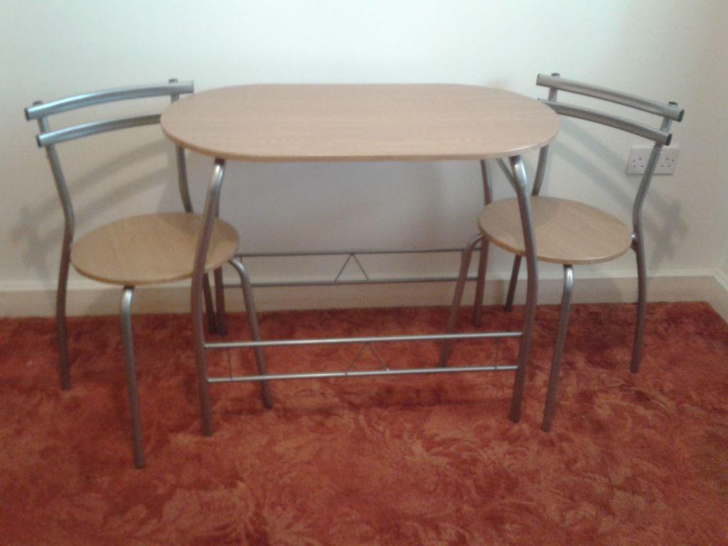 table and two chairs - Wood effect and chrome compact dining table ...