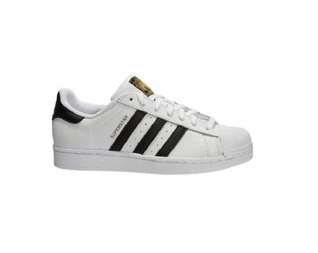 white black and gold adidas shoes