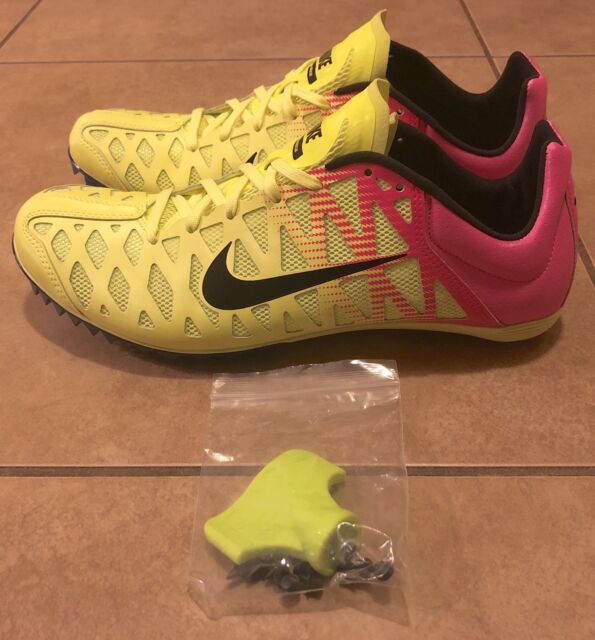 pink and yellow track spikes