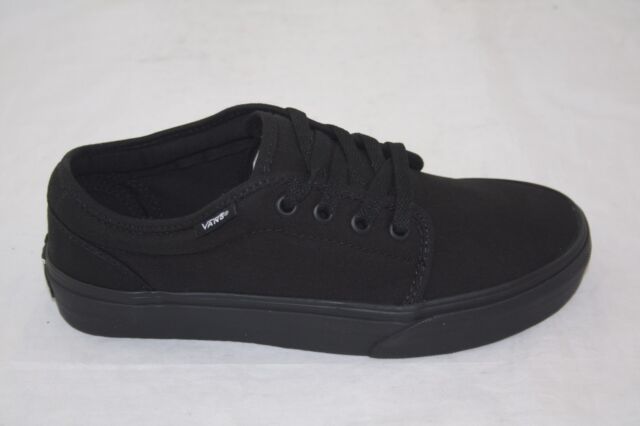all black vans with white laces