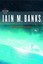Consider Phlebas by Iain M. Banks.